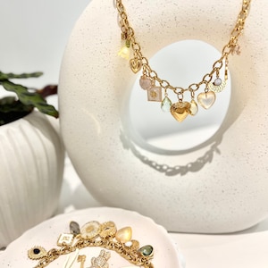 Custom Design Your Own Charm Necklace. High Quality 18k PVD Gold Plated. Vintage Inspired Hearts, Lockets, Evil Eye and Bows.