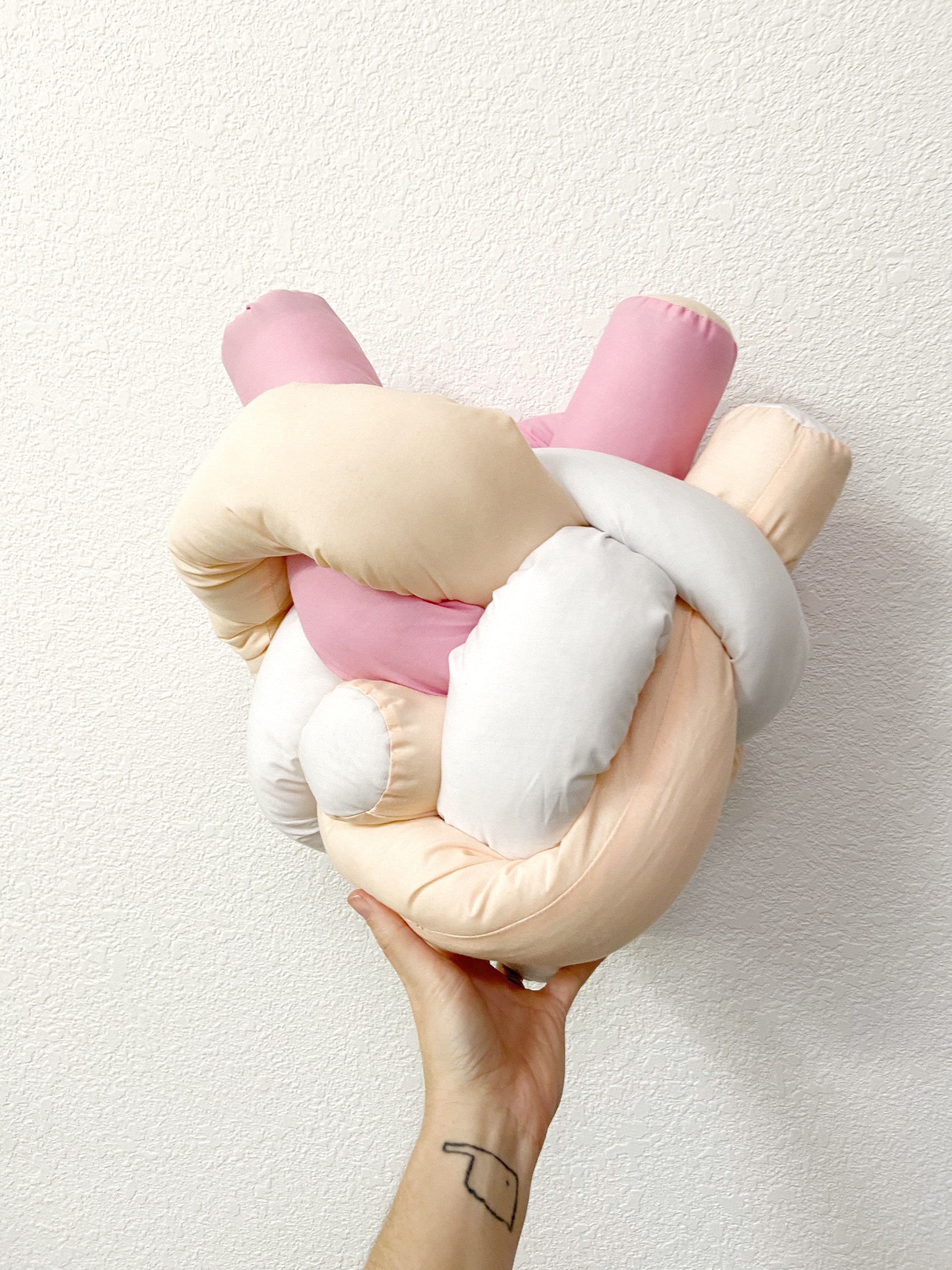 Oreiller Rose de Puzzle Tubes - Oreiller Noeud Trois en Un