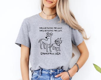 Camiseta "Se están comiendo a los perros", Camiseta de humor político