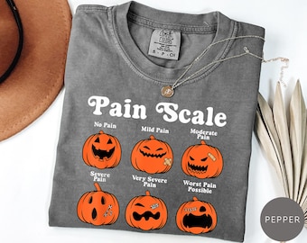 Comfort Colors Halloween Nurse T-Shirt, Pain Scale Pumpkin Fall Shirt