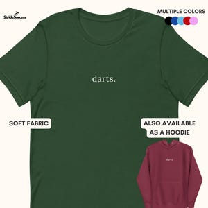 May include: A green short-sleeved t-shirt with the word "darts." printed in white on the front. The t-shirt is available in multiple colors and also as a hoodie.