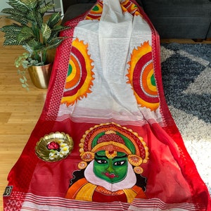 Exclusive handpainted  khadi handloom saree .