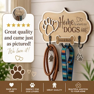 May include: A light brown wooden wall-mounted leash holder with a decorative scalloped edge. It features a large paw print cutout, the text "Home is where my DOGS ARE", and a bone-shaped plaque engraved with "Tessa & Rocky" above three black metal hooks.