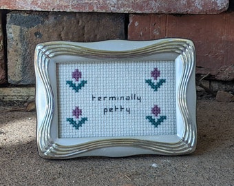 Terminally Petty framed mini cross stitch
