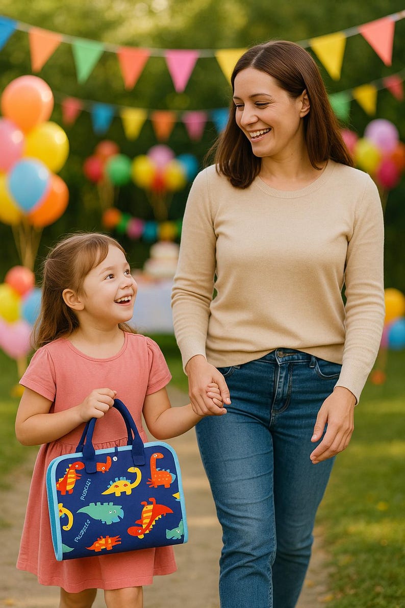 May include: A young girl and an adult woman are walking together, holding hands. The girl carries a blue tote bag with a dinosaur pattern. The background includes colorful balloons and festive decorations, suggesting a celebration.