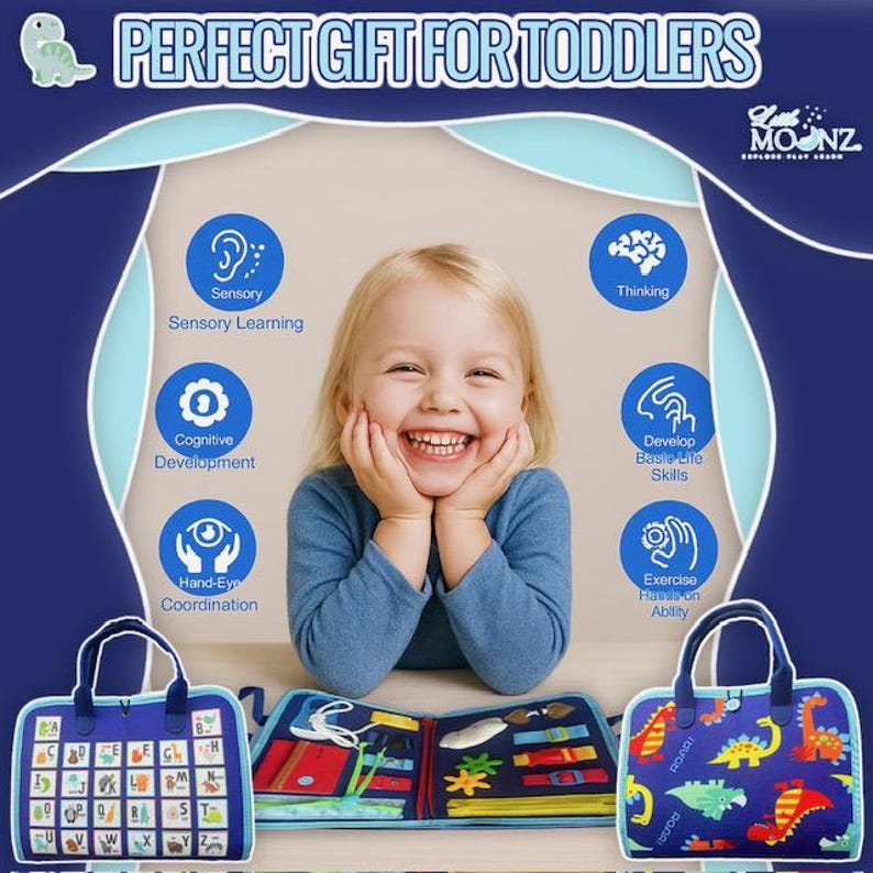 May include: A child smiles while holding a sensory learning toy. The image includes text that reads "PERFECT GIFT FOR TODDLERS". The toy is a blue fabric book with various interactive elements, and two matching tote bags with dinosaur designs.