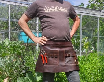 Leather waist apron for garden or workshop.