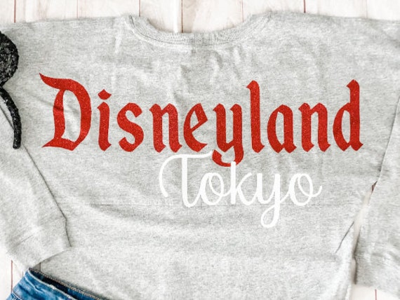 Disney Tokyo Sparkle Jersey Woman's Girl's Vinyl Pom Pom
