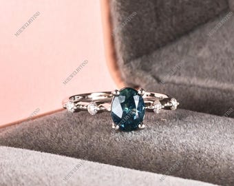 Anillo de zafiro azul turquesa, talla ovalada, plata de ley 925, con detalle de diamante.