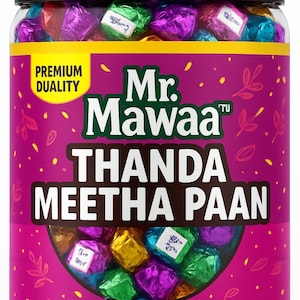 May include: A clear jar filled with colorful, foil-wrapped candies. The jar has a black lid and a pink label with the text "Mr. Mawaa Thanda Meetha Paan". The candies are in shades of green, purple, blue, and gold.