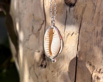 Cowrie Shell necklace set in silver