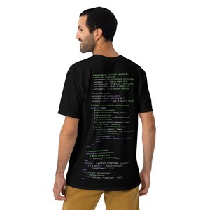 May include: A black t-shirt with a code printed on the back. The code is written in green, purple, and blue text and includes the words "self-awareness", "creativity", and "self-thought".