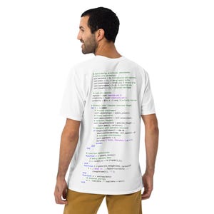 May include: A white t-shirt with a code printed on the back. The code is written in a green, blue, and purple font. The code includes the following text: "bootstrapping artificial consciousness", "self.memory = update_memory(self.memory, self.thoughts)", "activate consciousness", "print('I think, therefore I am %')".