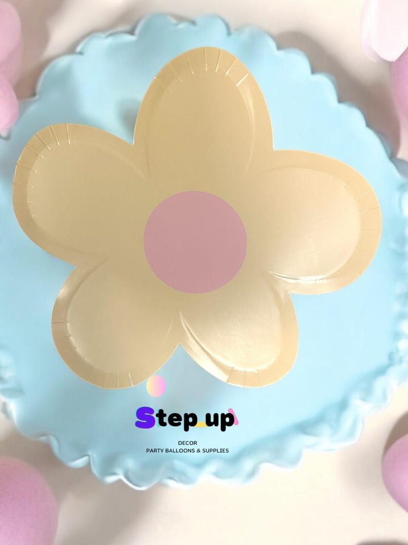 May include: A light blue balloon with a yellow flower design and a pink centre. The balloon has a ruffled edge and the text "Step up Decor Party Balloons & Supplies" printed on the bottom.