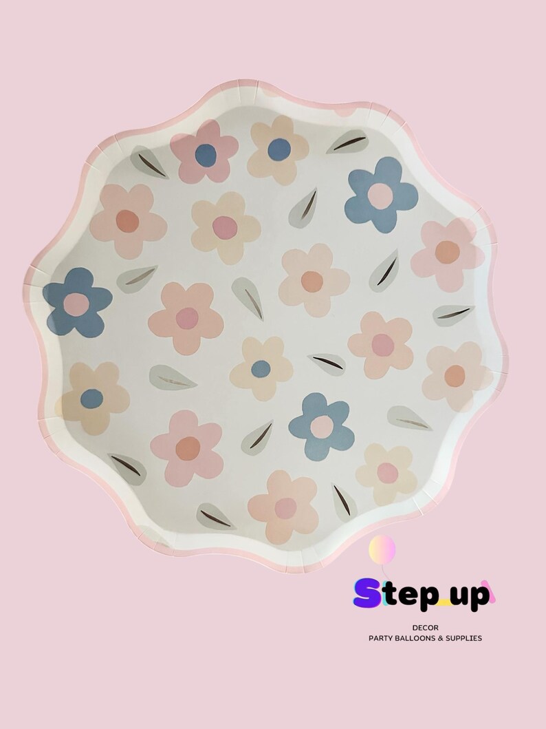 May include: White paper party plates with a pink, blue and peach floral pattern. The plates have a scalloped edge and are ideal for a spring or summer party.