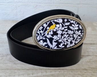 The Natalie Belt.  Black, White (and yellow) Buckle with Black Leather Belt