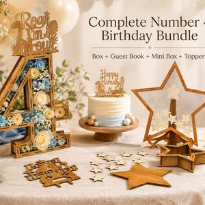 May include: A wooden number 4 birthday decoration filled with blue and cream flowers. The number is part of a bundle that includes a cake topper, star-shaped decorations, and a mini box. The text "Roar I'm Four" is on top.