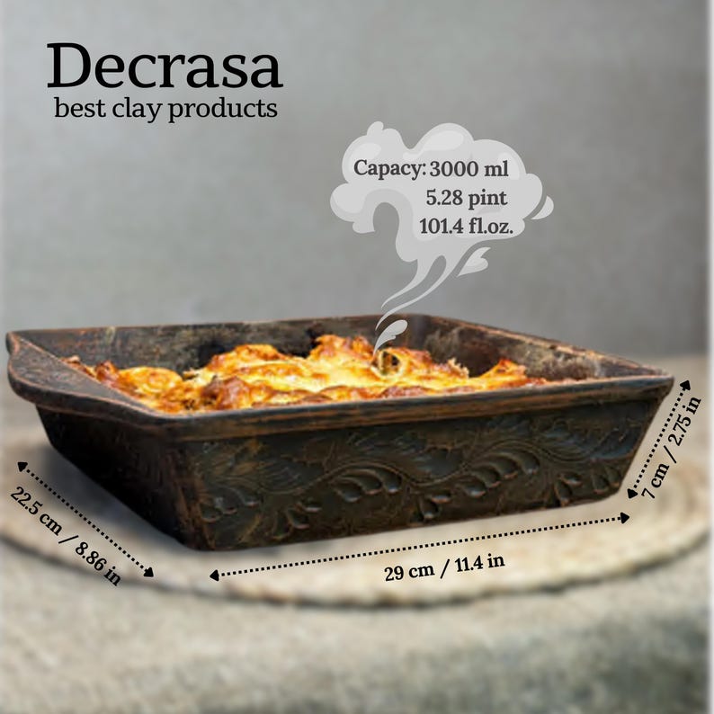May include: A dark brown rectangular clay baking dish with an embossed leaf pattern on the sides, containing cooked food. Text reads Decrasa best clay products. Dimensions are 22.5 cm by 29 cm by 7 cm, or 8.86 in by 11.4 in by 2.75 in, with a 3000 ml capacity.