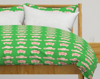 Duvet Cover featuring a rendition of the classic lowrider car in blue and white