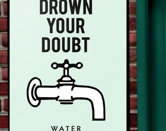 May include: A framed sign with the words "DROWN YOUR DOUBT" above a faucet illustration and the words "WATER YOUR WILL" below. The sign has a light green background and a black frame.