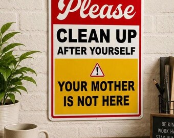 May include: A rectangular metal sign with a red top section that reads "Please" in white script. The middle section says "CLEAN UP AFTER YOURSELF" in black block letters. The bottom section, yellow, reads "YOUR MOTHER IS NOT HERE".