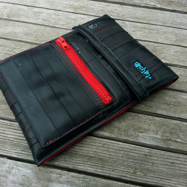 Eco friendly padded mini iPad sleeve made with reclaimed seat belts.