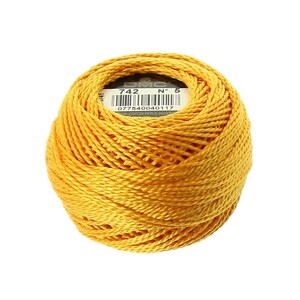 May include: A ball of DMC embroidery floss in a bright yellow color. The label on the ball reads "DMC N° 5 742 077540040117  100% COTTON PERLE ALGO",