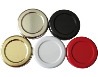 May include: Five round metal jar lids in different colours: silver, black, gold, white and red.