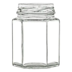 May include: A clear, empty glass jar with a hexagonal body and a threaded neck. The jar is designed for preserving food items and has a wide mouth for easy filling and access.