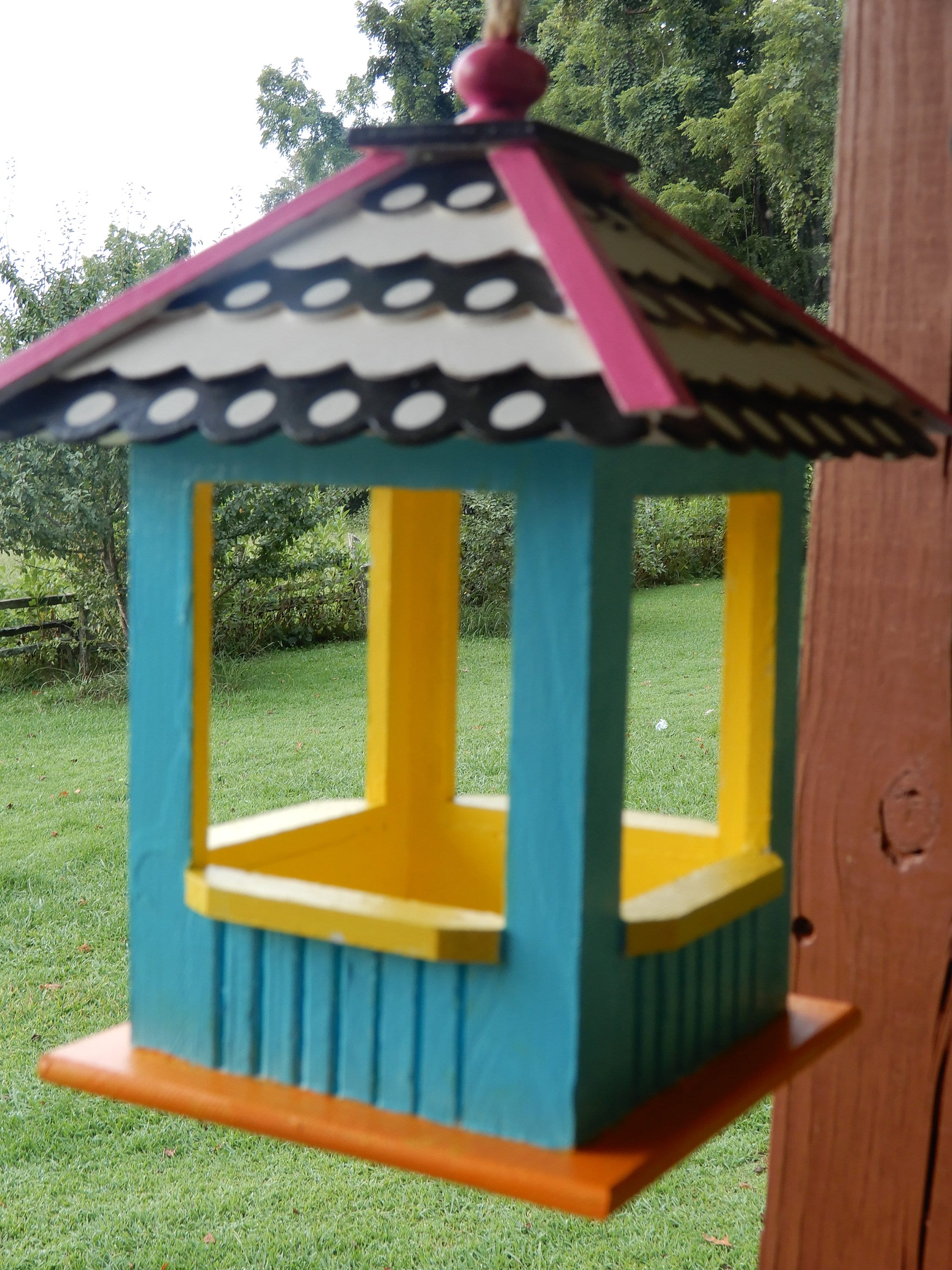 Painted wooden bird feeders