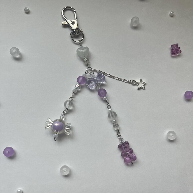thumbnail interactive-video image 1 of Y2k Purse Y2K Star Keychain With Cross Bead - Cute Phone Case Charm For Girls & Teens Y2k Phone Keychain 1 of 14