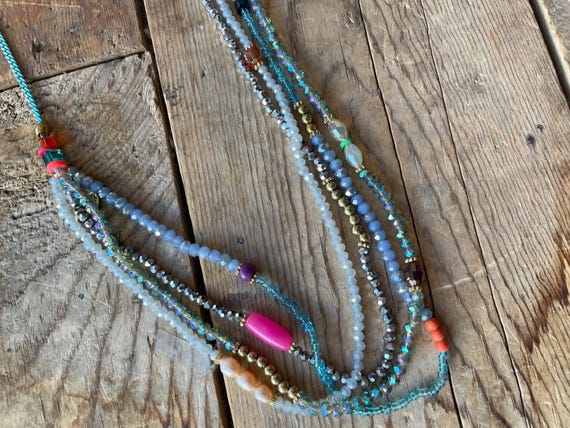 Multi strand sparkly necklace in blues
