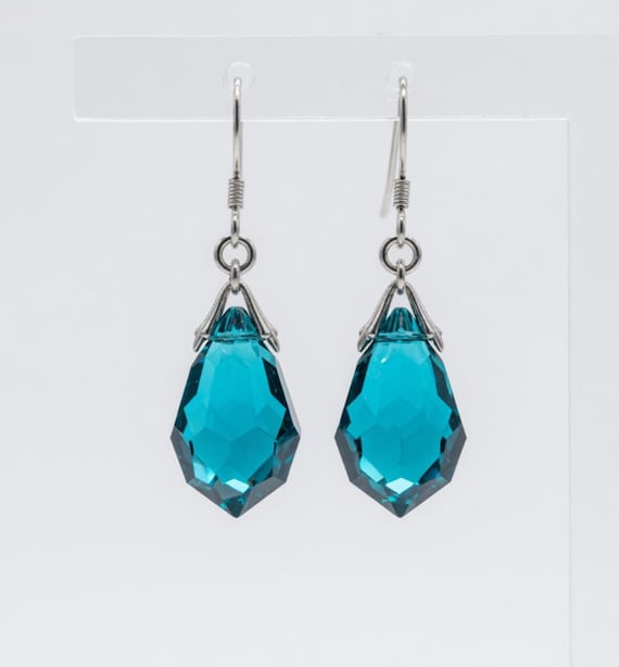Crystal teal with silver  dangling earrings