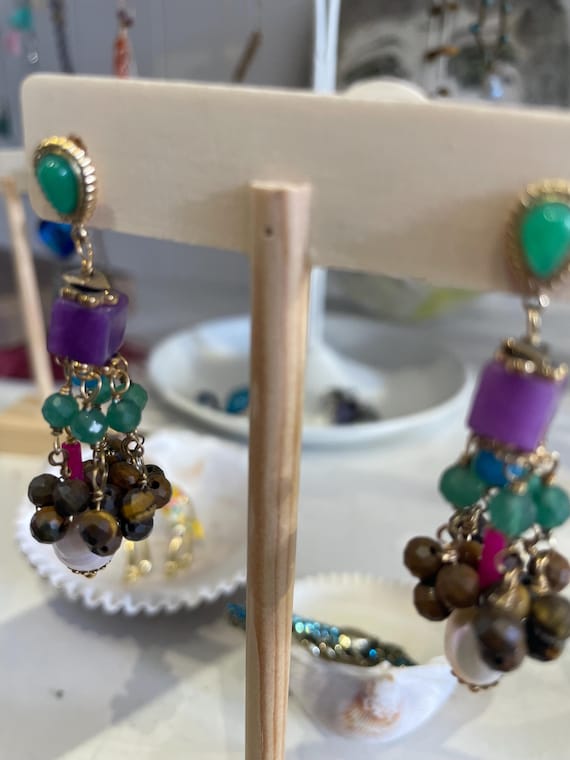 Purple and green beaded dangling earrings