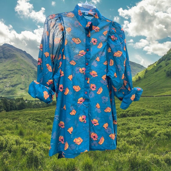 Mara blouse in  teal cotton with orange floral
