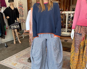 One size navy with orange and pink trim sweater