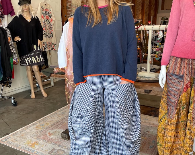 One size navy with orange and pink trim sweater