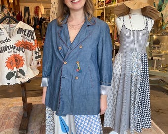 Lined denim jacket with hand sewn details  in one size