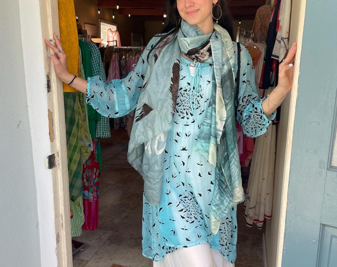 Stunning flocked viscouse in turquoise with little black swallows