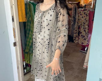 Stunning flocked viscouse in smoke with little black swallows