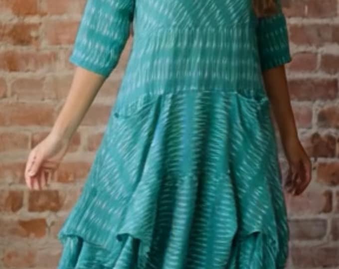 Prairie dress with pockets and 3/4 sleeves in grass green cotton