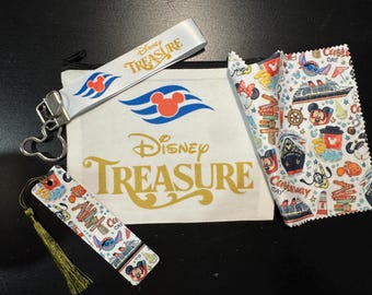 May include: A collection of Disney Treasure themed items. Includes a white pouch with a black zipper, a lanyard, a bookmark with a gold tassel, and a patterned cloth. The items feature Mickey Mouse and cruise ship designs.