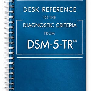 May include: A blue spiral-bound book titled Desk Reference to the Diagnostic Criteria from DSM-5-TR. The cover features white text centered within a thin white rectangular border, with horizontal lines above and below the main title text.