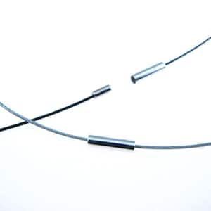 May include: Two silver metal necklace chains with silver metal end caps. One chain is black and the other is silver.