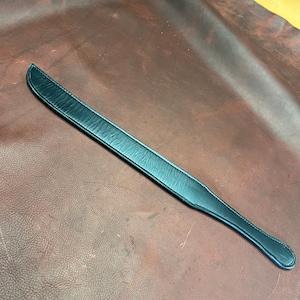Black Spanking Strap sword