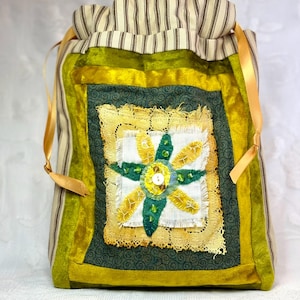 May include: A set of three ceramic mugs with a speckled, matte finish. The mugs are in shades of cream, light gray, and dark gray. Each mug has a simple, minimalist design, perfect for coffee or tea.