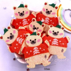 May include: A group of six white felt Christmas bear ornaments with red sweaters and green hats. The bears are approximately 4.2 cm tall and 3.2 cm wide.