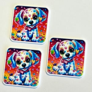 May include: Three square stickers featuring a cartoon dog with a colorful design. The dog has a white body with heart-shaped spots, blue ears, and a red bow. The background is a gradient of red, orange, and yellow with heart and butterfly accents.