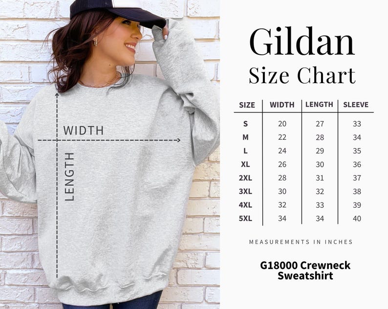 May include: A light gray Gildan G18000 crewneck sweatshirt. The image includes a size chart with measurements in inches for sizes S to 5XL. The chart shows width, length, and sleeve measurements. The sweatshirt is shown on a person.