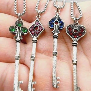 EXCLUSIVE Resident Evil 2 Remake Precinct Key Pendant Necklace Set, 950 Sterling Silver Club, Diamond, Spade & Heart Keys with Gemstones